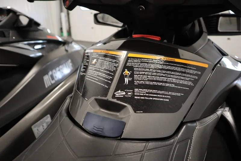 Slide: The Image of 2013 Sea-Doo GTX 260 iS Limited dashboard with safety instructions and warning labels. - 33