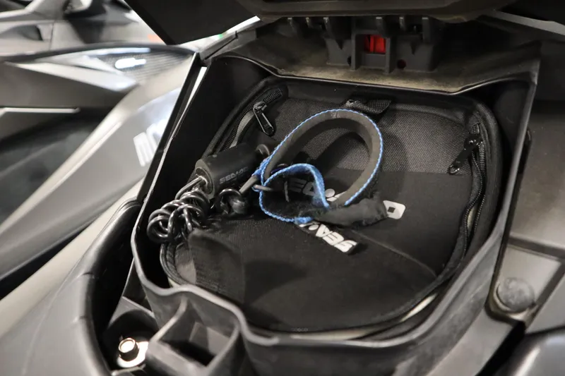 Slide: The Image of 2013 Sea-Doo GTX 260 iS Limited storage compartment with accessories. - 34