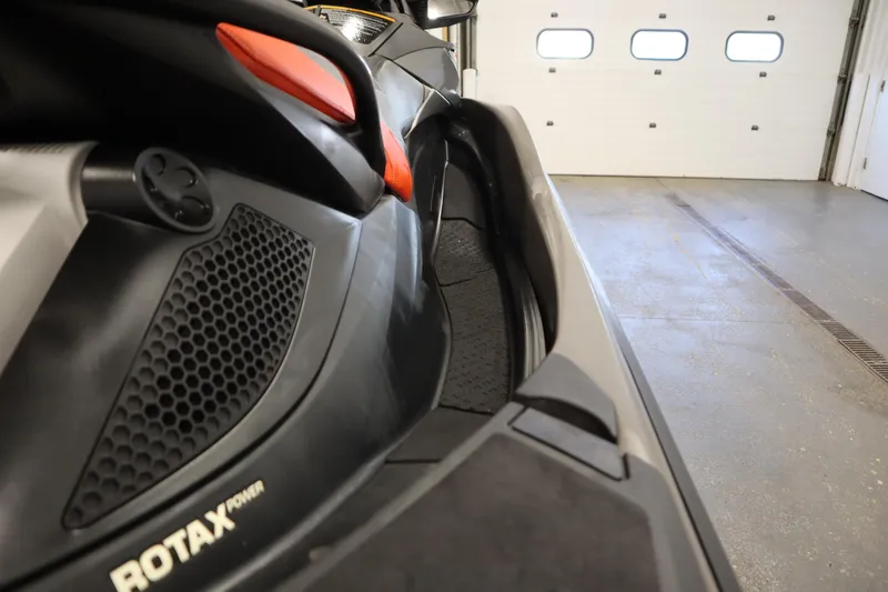 Slide: The Image of 2013 Sea-Doo GTX 260 iS Limited jet ski in a garage, showcasing Rotax power. - 36