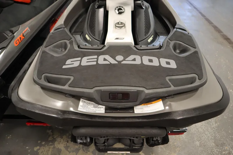 Slide: The Image of 2013 Sea-Doo GTX 260 iS Limited jet ski rear view in a showroom. - 38