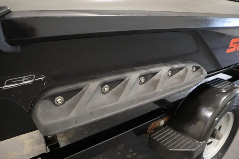 Slide: The Image of 2013 Sea-Doo GTX 260 iS Limited, close-up of hull and trailer. - 40