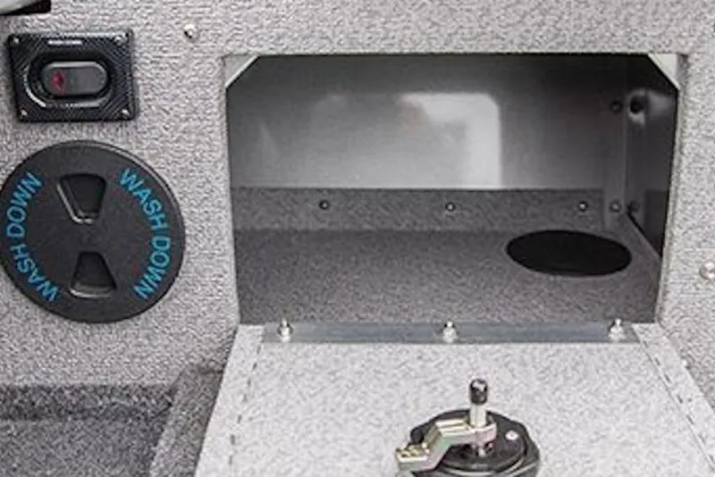 Slide: The Image of Interior compartment of 2026 Crestliner 1850 Commander boat with washdown feature. - 11