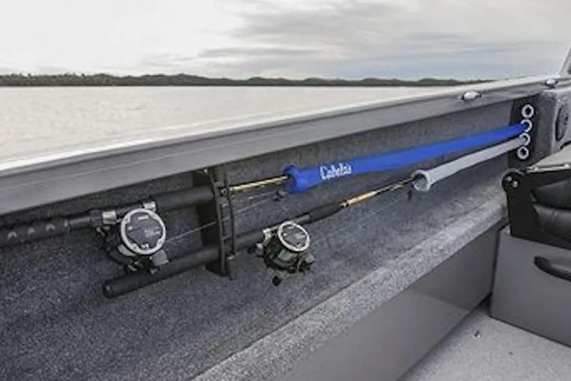 Slide: The Image of 2026 Crestliner 1850 Commander boat interior with fishing rod storage. - 15