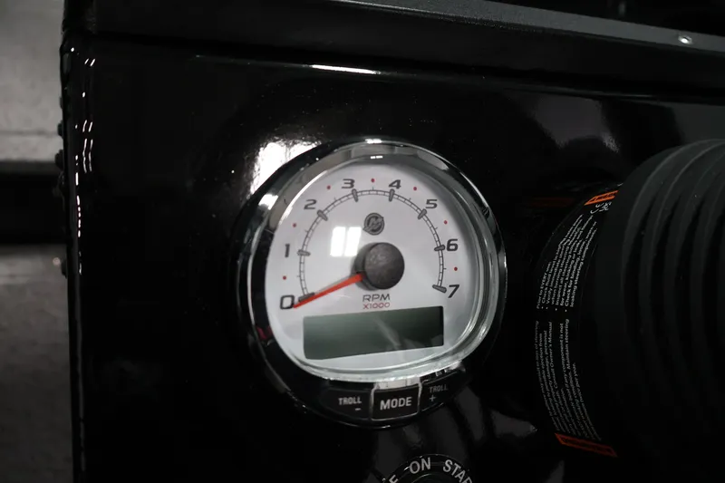 Slide: The Image of Tachometer on 2026 Crestliner 1850 Commander boat dashboard, displaying RPM gauge. - 19
