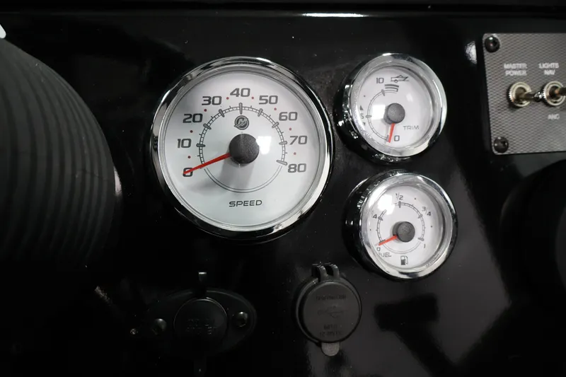 Slide: The Image of Dashboard gauges of 2026 Crestliner 1850 Commander boat, featuring speedometer, trim, and fuel indicators. - 20