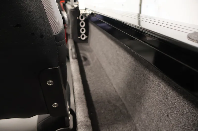 Slide: The Image of Interior view of 2026 Crestliner 1850 Commander boat, featuring seating and storage area. - 31