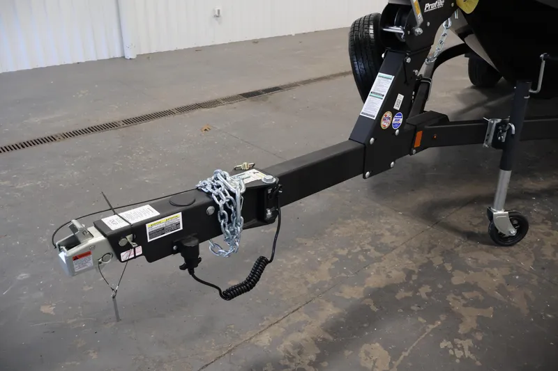 Slide: The Image of Trailer hitch of 2026 Crestliner 1850 Commander boat in a garage setting. - 39