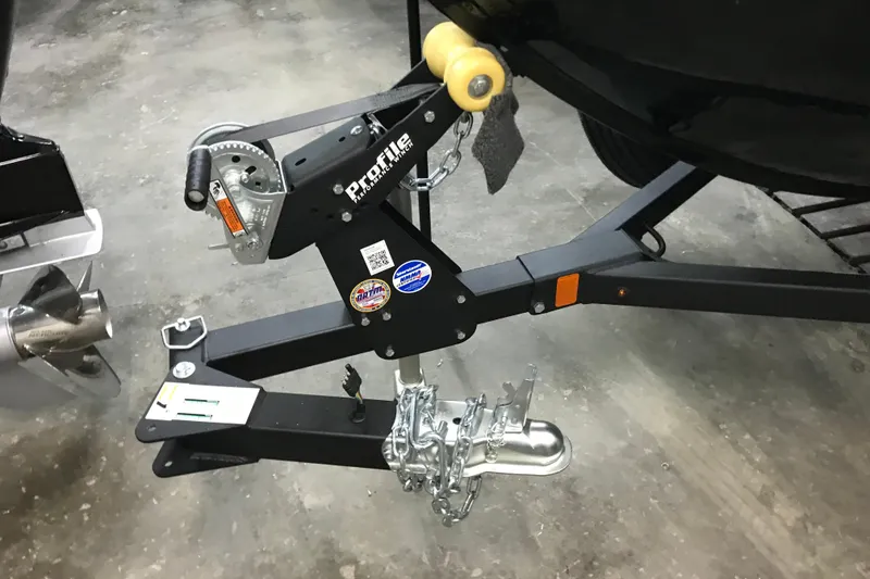 Slide: The Image of Trailer hitch and winch of 2026 Lund 1650 Rebel XL Sport boat. - 9