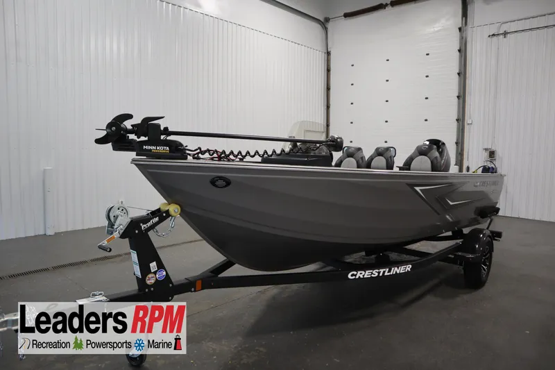 The Image of 2026 Crestliner 1650 Kodiac SC fishing boat in showroom, featuring Minn Kota trolling motor. - 0