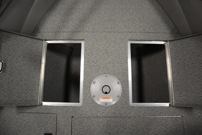 Slide: The Image of Interior storage compartments of 2026 Crestliner 1650 Kodiac SC boat. - 16