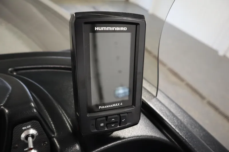 Slide: The Image of Humminbird PiranhaMAX 4 fish finder on 2026 Crestliner 1650 Kodiac SC boat dashboard. - 26