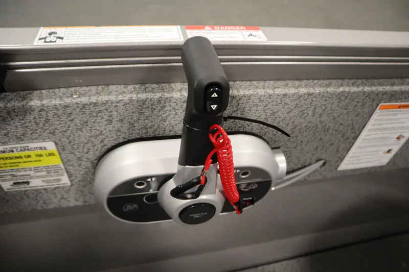Slide: The Image of Throttle control of 2026 Crestliner 1650 Kodiac SC boat with safety lanyard attached. - 28