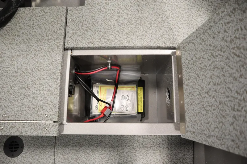 Slide: The Image of Battery compartment of 2026 Crestliner 1650 Kodiac SC boat, featuring secure wiring setup. - 35