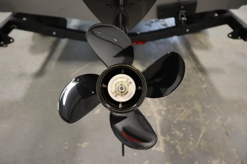 Slide: The Image of Propeller of 2026 Crestliner 1650 Kodiac SC boat on display in a showroom. - 40