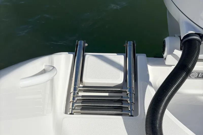 Slide: The Image of 2024 Edgewater 262CC boat ladder and deck detail. - 9