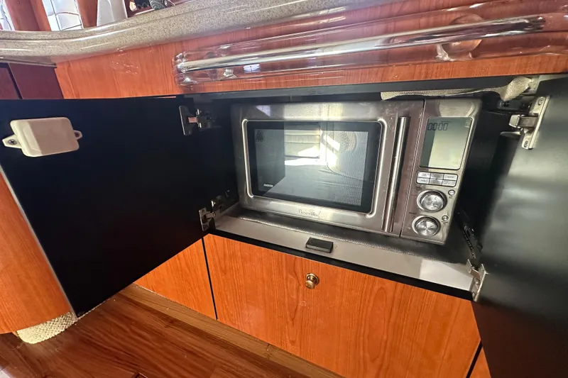 Slide: The Image of Microwave in 2001 Sea Ray 510 Sundancer yacht kitchen cabinet. - 17