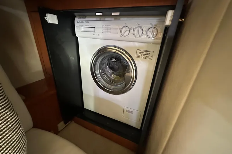 Slide: The Image of Washing machine inside 2001 Sea Ray 510 Sundancer yacht cabin. - 19