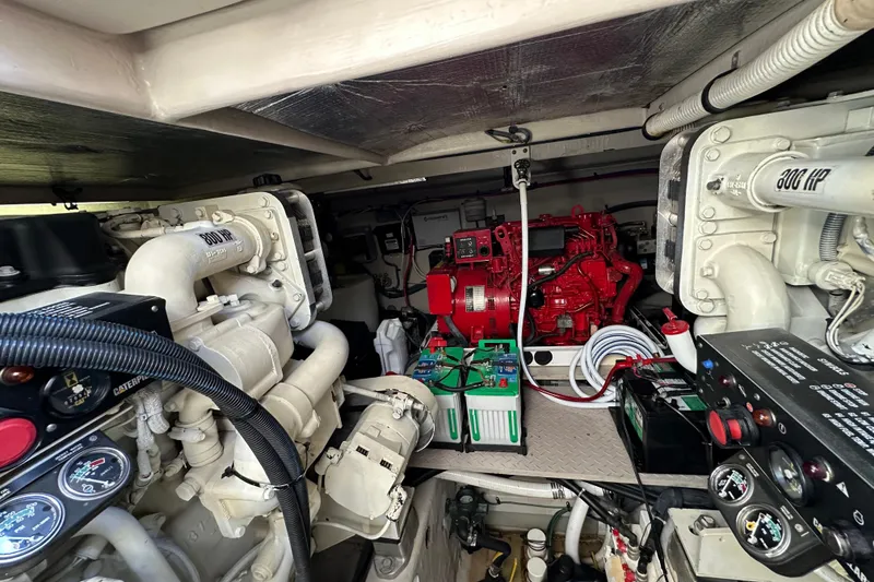 Slide: The Image of Engine room of 2001 Sea Ray 510 Sundancer with Caterpillar engines and generator. - 30