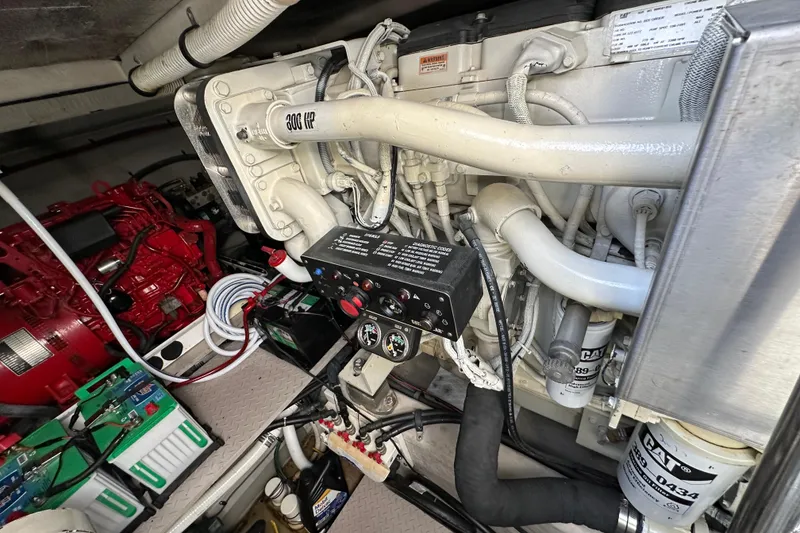 Slide: The Image of Engine room of 2001 Sea Ray 510 Sundancer with visible components and wiring. - 31
