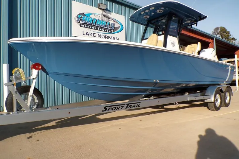 Slide: The Image of 2025 Sportsman Masters 247 boat on trailer at Foothills Marine Center, Lake Norman. - 17