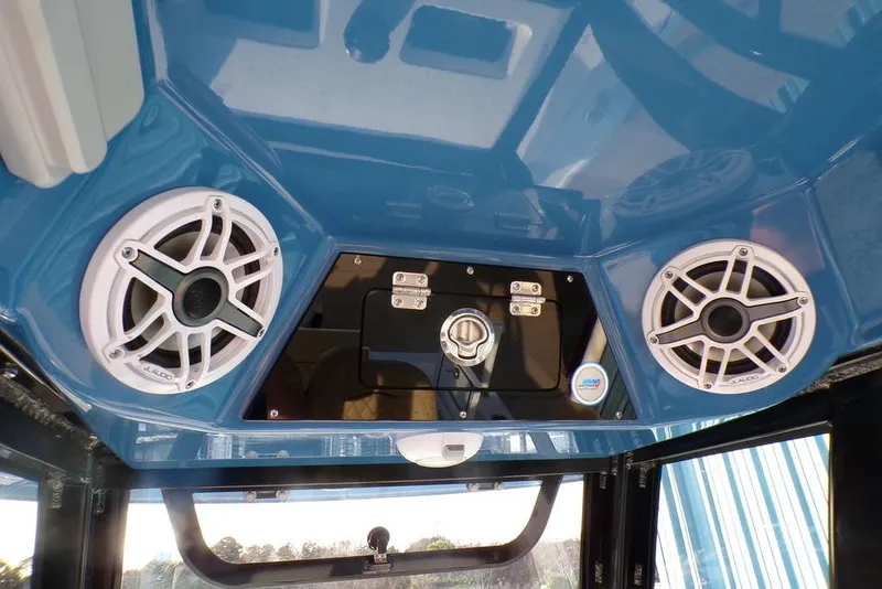 Slide: The Image of 2025 Sportsman Masters 247 boat interior with speakers and control panel. - 38