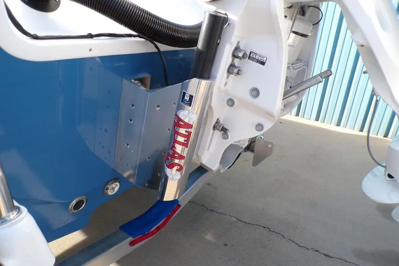 Slide: The Image of Close-up of 2025 Sportsman Masters 247 boat's Atlas hydraulic jack plate. - 6
