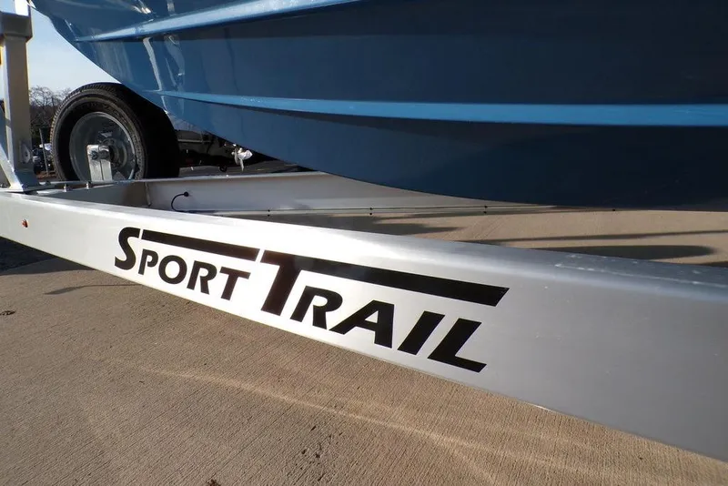 Slide: The Image of Trailer for 2025 Sportsman Masters 247 boat, featuring "Sport Trail" branding. - 9