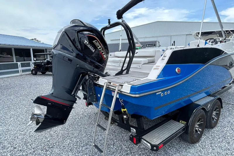 Slide: The Image of 2023 Starcraft SVX 231 OB DH boat with Yamaha outboard motor on trailer. - 5