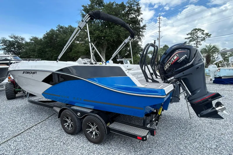Slide: The Image of 2023 Starcraft SVX 231 OB DH boat with Yamaha outboard motor on trailer. - 7