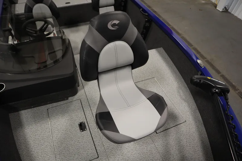 Slide: The Image of 2026 Crestliner 1650 Hawk Side Console boat interior with sleek seating and console design. - 15