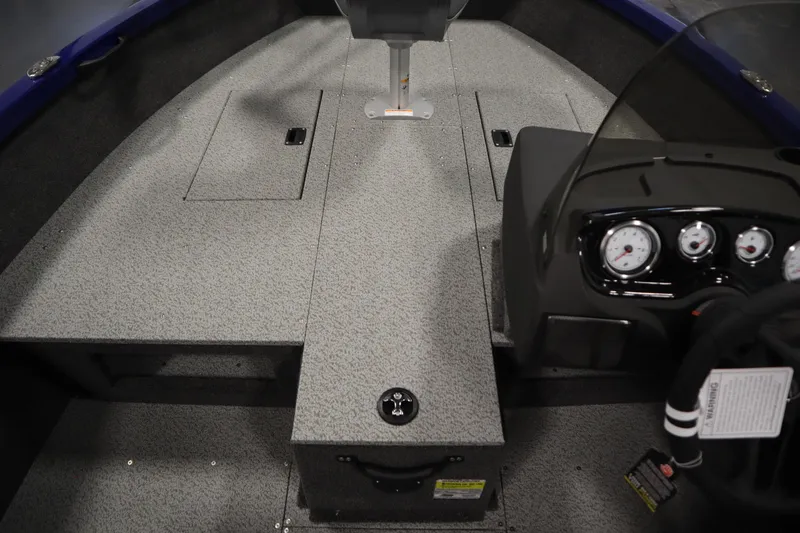 Slide: The Image of 2026 Crestliner 1650 Hawk Side Console interior with dashboard and storage compartments. - 20