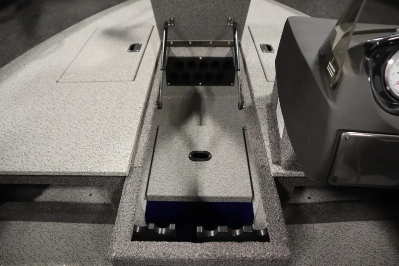 Slide: The Image of 2026 Crestliner 1650 Hawk Side Console interior with storage compartments and console details. - 21