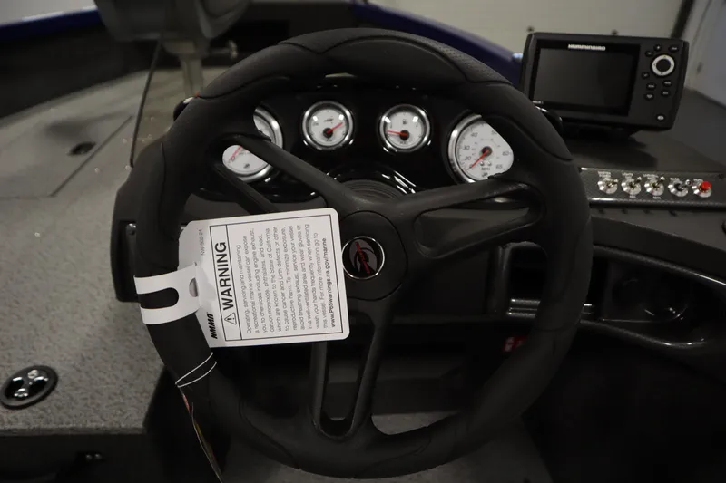 Slide: The Image of Steering wheel and dashboard of 2026 Crestliner 1650 Hawk Side Console boat. - 24