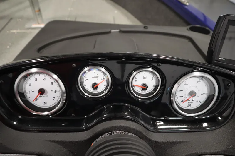 Slide: The Image of Dashboard of 2026 Crestliner 1650 Hawk Side Console with gauges and controls. - 25