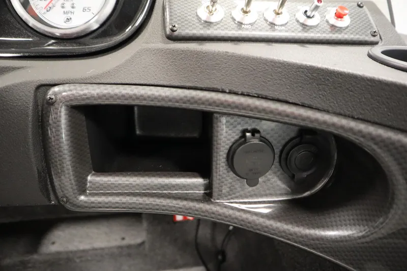 Slide: The Image of Dashboard of 2026 Crestliner 1750 Hawk Side Console with switches and speedometer. - 27