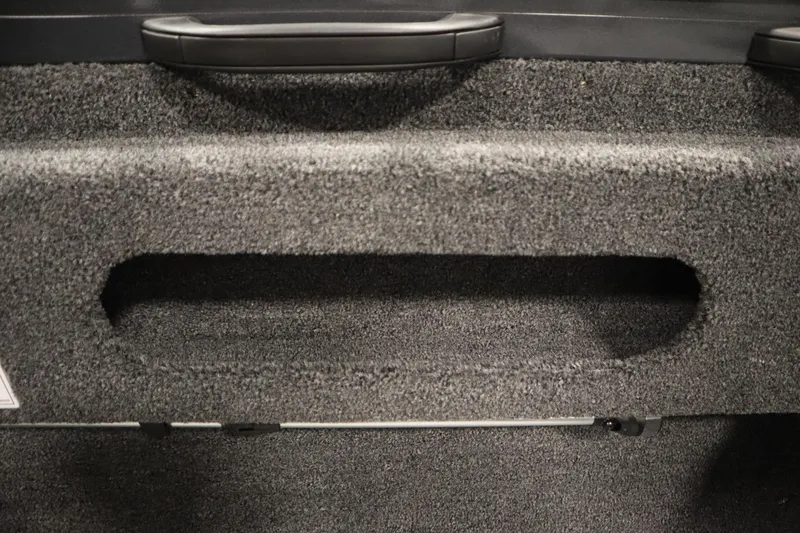 Slide: The Image of 2026 Crestliner 1750 Hawk Side Console interior detail with textured storage compartment. - 34