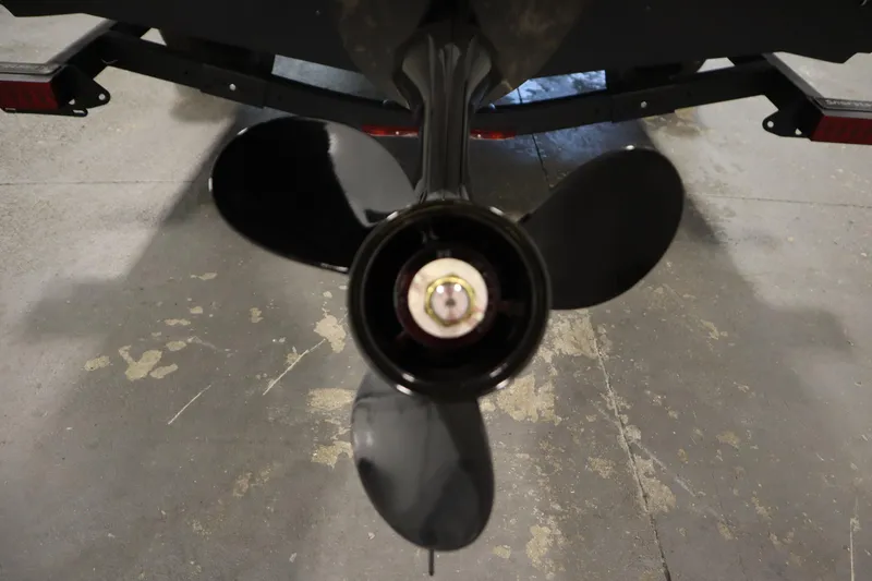 Slide: The Image of Propeller of 2026 Crestliner 1750 Hawk Side Console boat on concrete floor. - 40