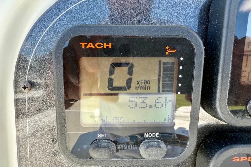 Slide: The Image of Tachometer display on 2003 Sailfish 266 CC boat, showing zero RPM. - 17