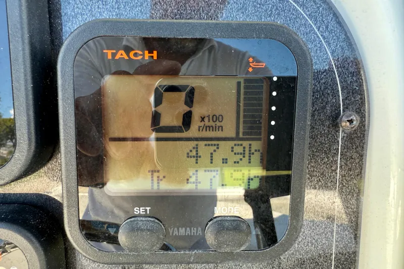Slide: The Image of Close-up of a Yamaha tachometer on a 2003 Sailfish 266 CC boat. - 18