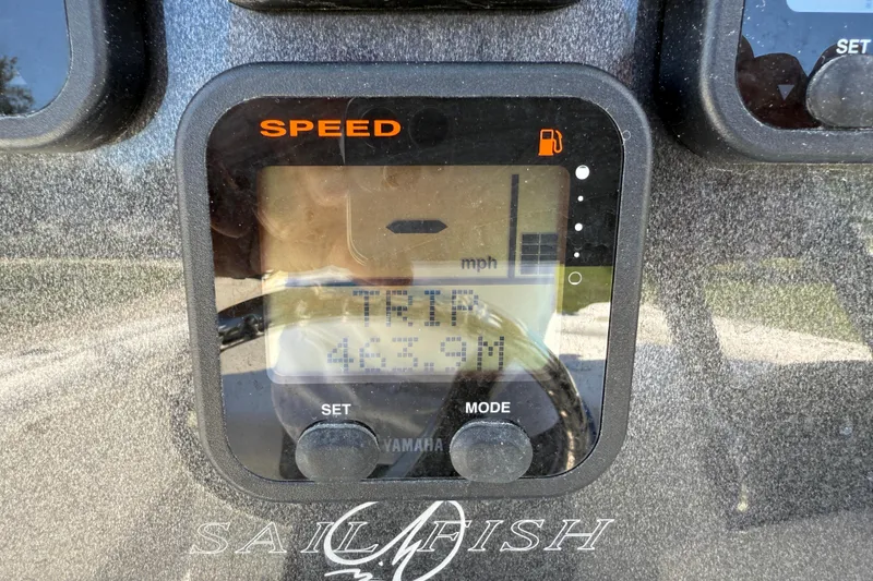 Slide: The Image of Close-up of a 2003 Sailfish 266 CC speedometer display showing trip mileage. - 20