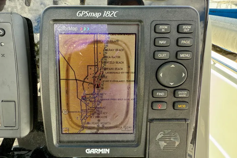 Slide: The Image of Garmin GPSmap 182C displaying nautical map on Sailfish 266 CC, 2003 model. - 24