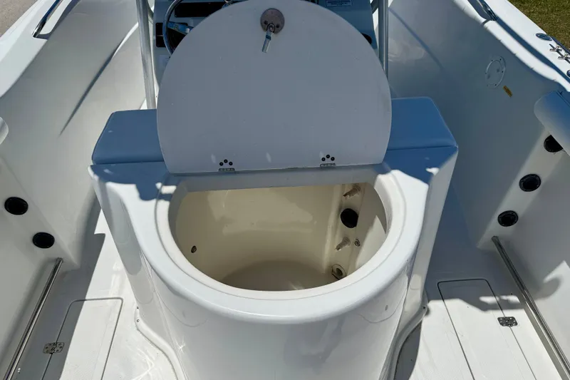 Slide: The Image of Livewell on 2003 Sailfish 266 CC boat, open lid, white interior. - 26