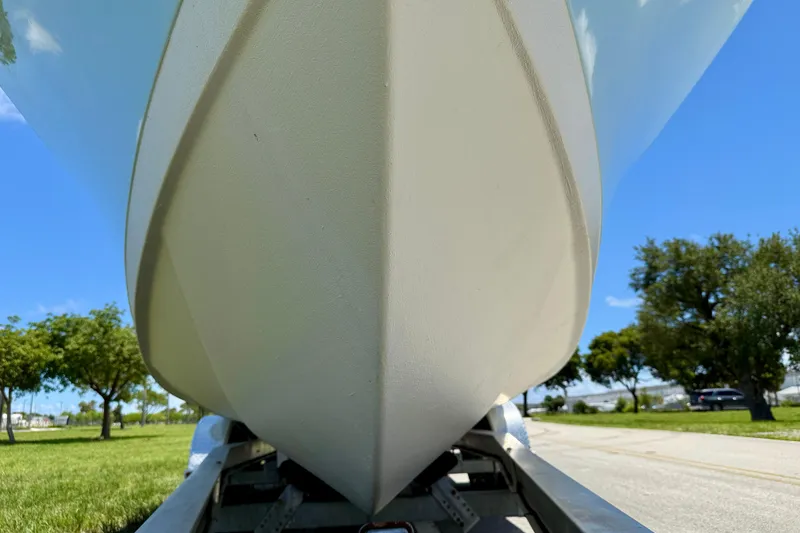 Slide: The Image of Close-up of 2003 Sailfish 266 CC boat hull on trailer, sunny day. - 37
