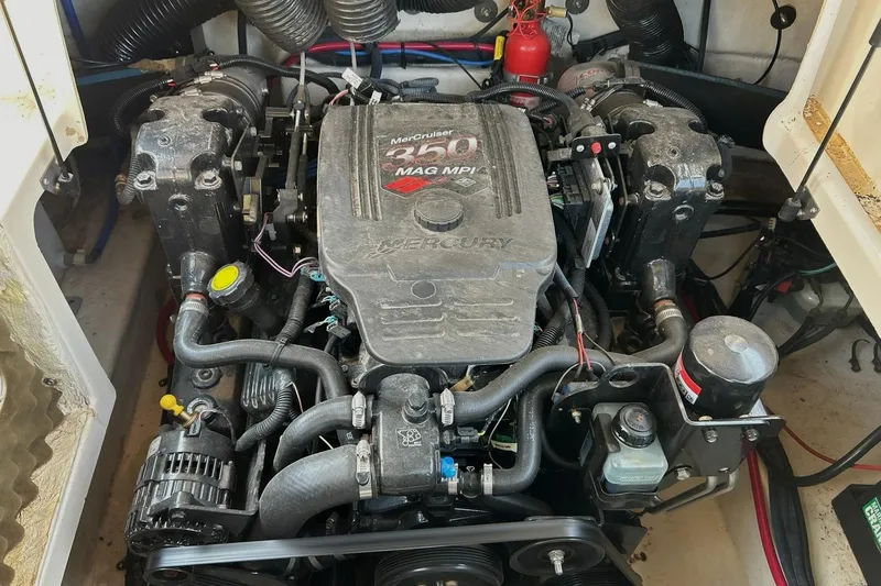 Slide: The Image of Engine compartment of a 2006 Sea Ray 240 Sundeck with MerCruiser 350 MAG MPI engine. - 30