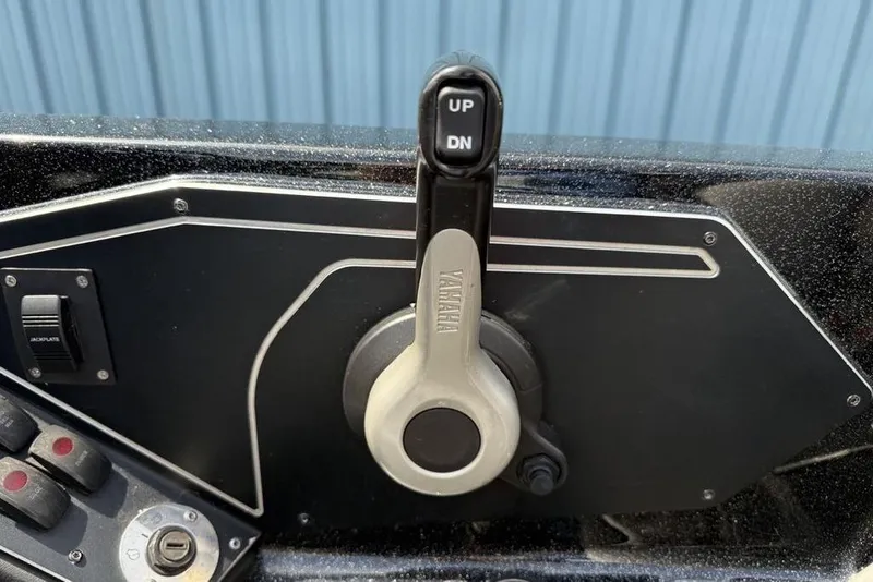 Slide: The Image of 2016 Skeeter ZX250 boat control panel with Yamaha throttle lever. - 22