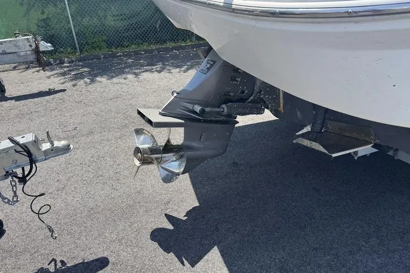 Slide: The Image of 2000 Weldcraft 26 Martinque boat with visible propeller and trailer hitch. - 10