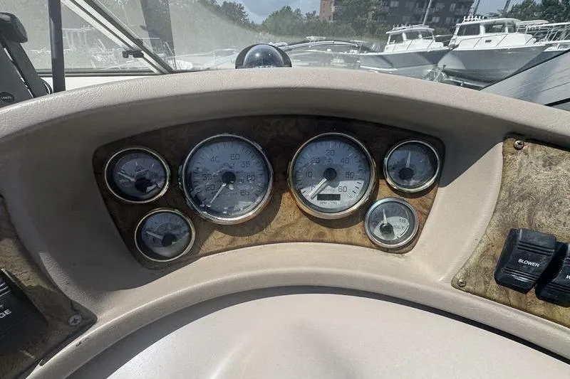 Slide: The Image of Dashboard of a 2000 Weldcraft 26 Martinque boat with gauges and controls. - 7