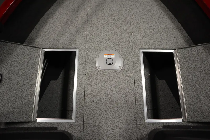 Slide: The Image of Interior view of 2026 Crestliner 1750 Hawk Walkthrough boat storage compartments. - 16
