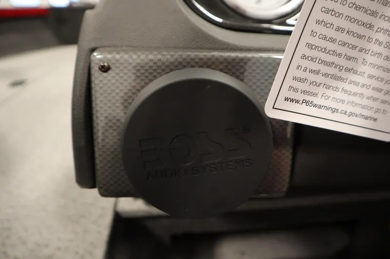 Slide: The Image of BOSS Audio Systems in 2026 Crestliner 1750 Hawk Walkthrough boat dashboard. - 25