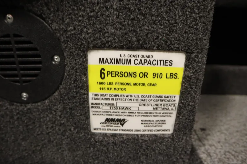 Slide: The Image of Capacity label on 2026 Crestliner 1750 Hawk Walkthrough boat, 6 persons or 910 lbs limit. - 29